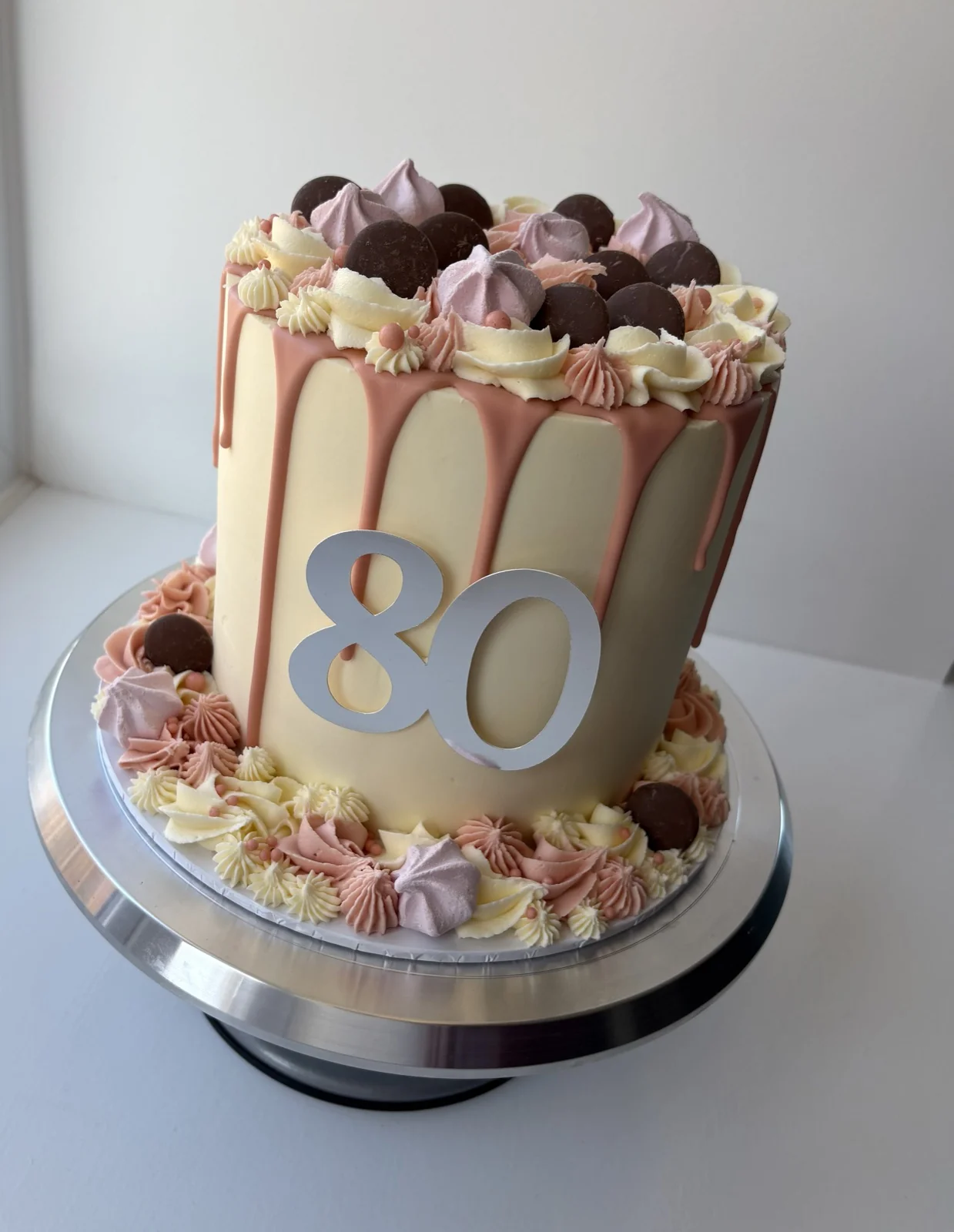 An 80th birthday drip celebration cake